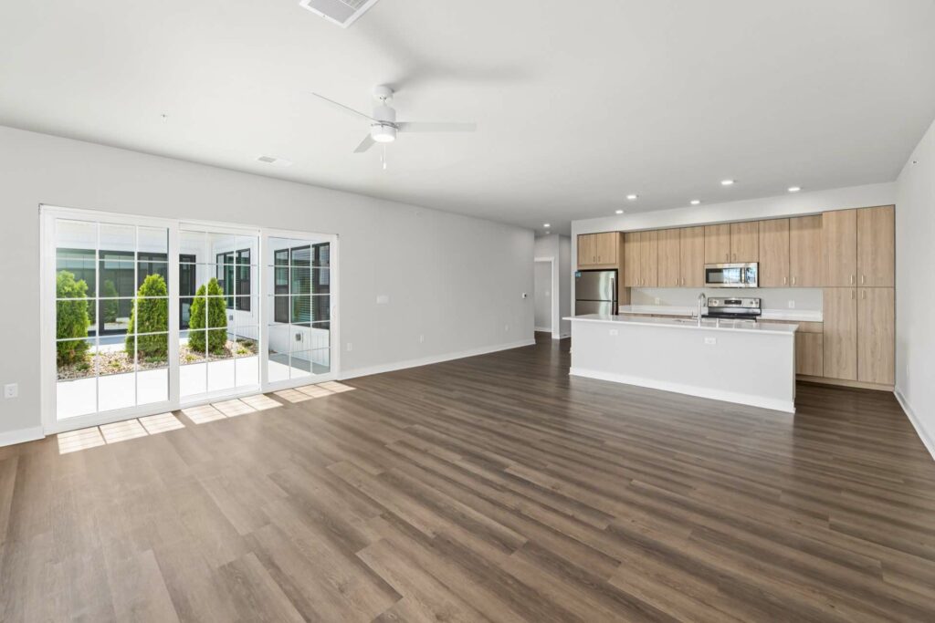 Open floor layout with living room and kitchen